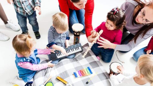 Foto Muziek op Schoot