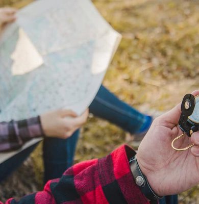 close-up-hiker-with-compass-his-hand