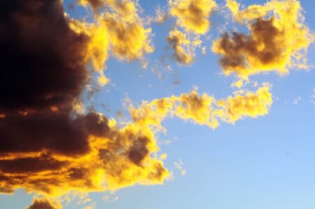 Sky with clouds and sun