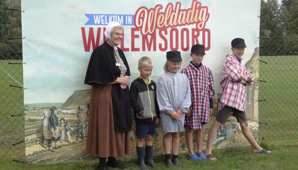 als paupertjes op de foto