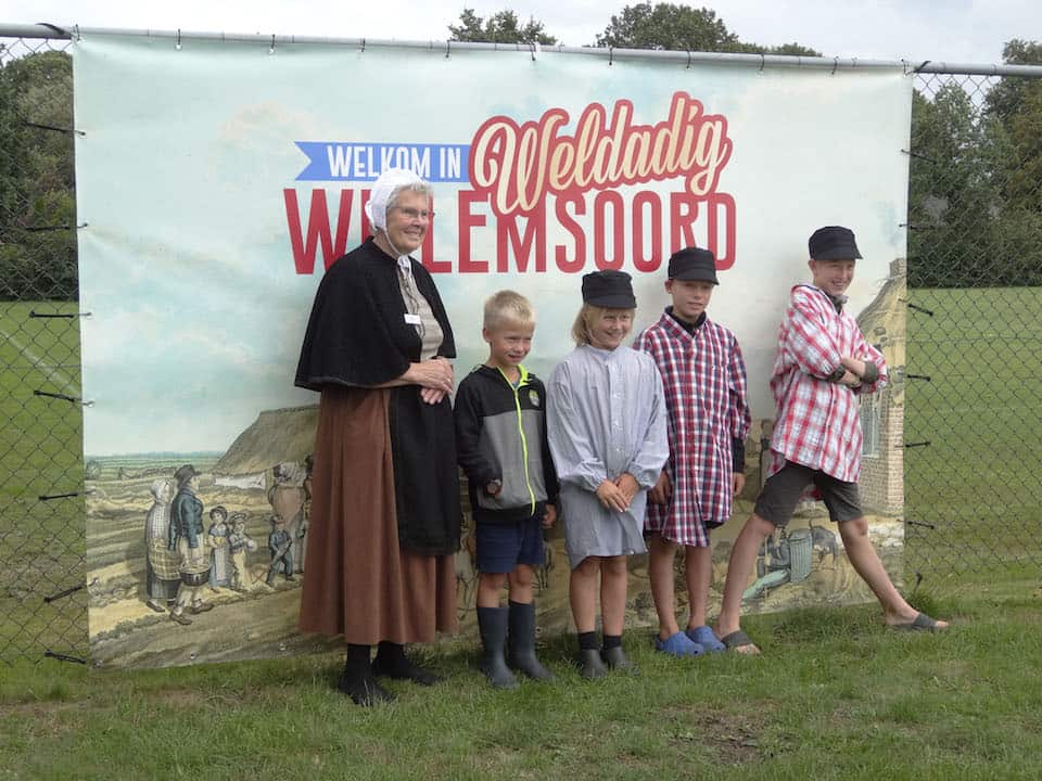 als paupertjes op de foto