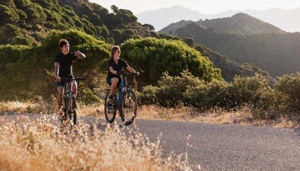 close-up-couple-with-electric-bikes