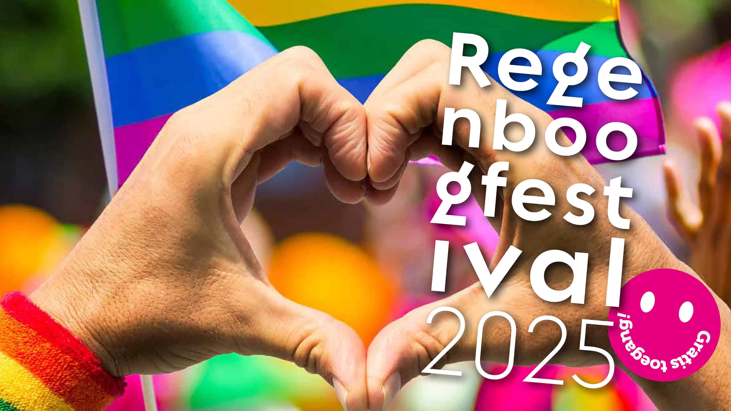 Kleurrijke handen vormen een hart tijdens het LGBT+ Pride Festival 2025 met regenboogvlag in de achtergrond.